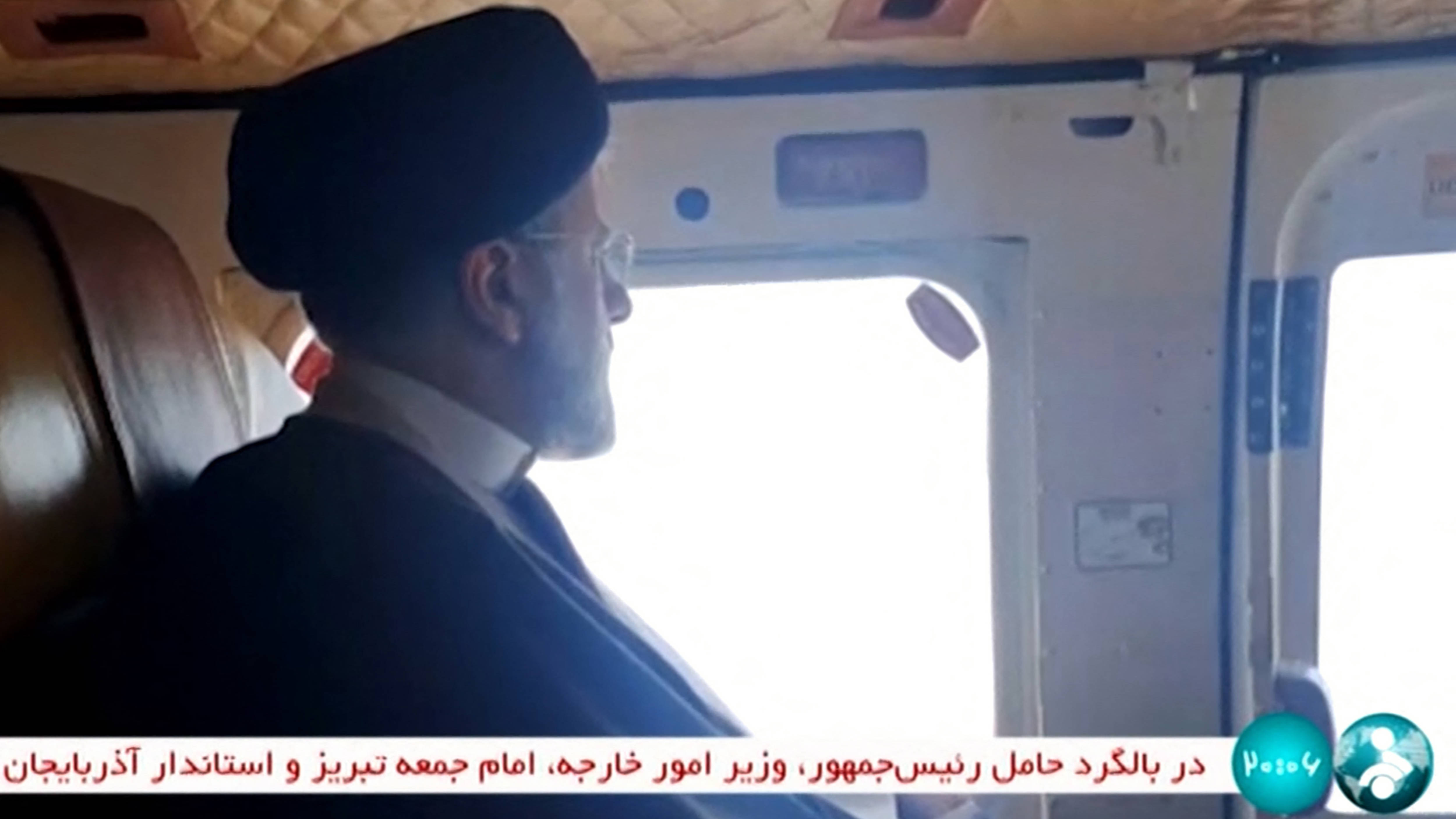 This video grab shows Iran's President Ebrahim Raisi on board a helicopter in the Jolfa region of the western province of East Azerbaijan, 19 May 2024 (IRINN/AFP) 